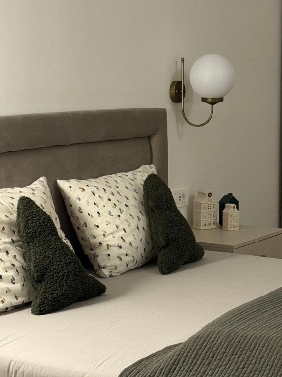 Postel nebo postele na pokoji v ubytování Belvedere Studio Apartman