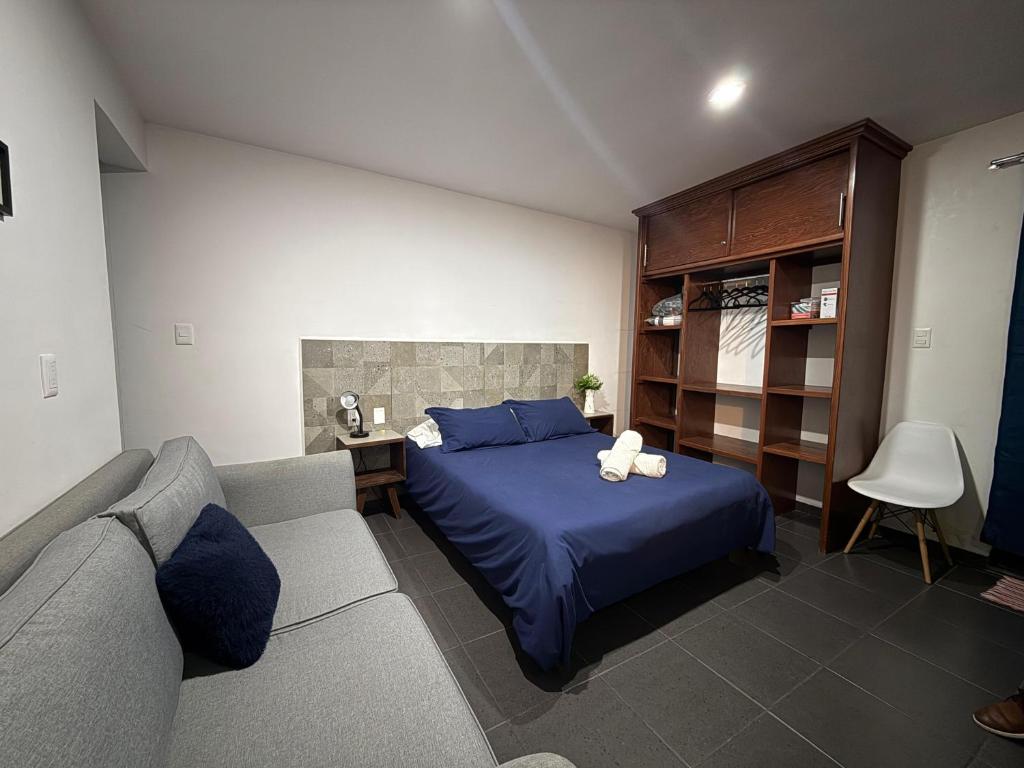 Ένα ή περισσότερα κρεβάτια σε δωμάτιο στο Lofts de Mexiamora