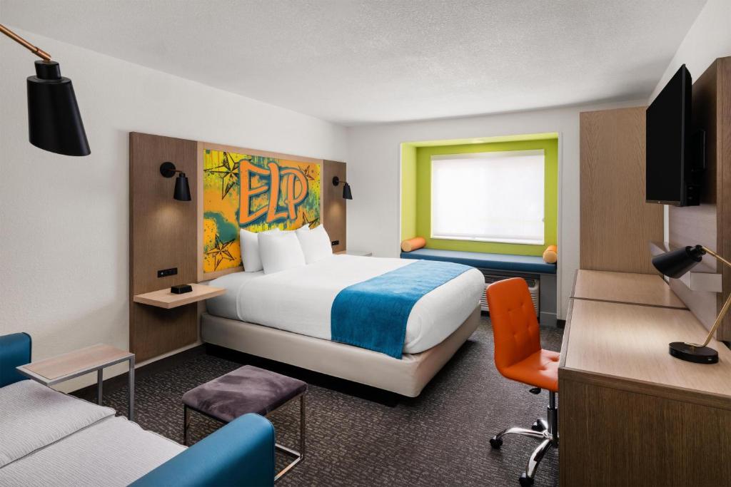 a hotel room with a bed and a desk at Best Western El Paso Airport Entrada Hotel in El Paso