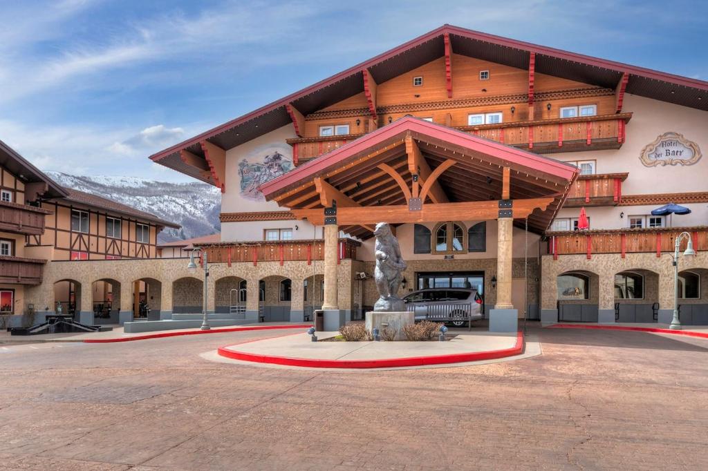 a large building with a fountain in front of it at Zermatt Double Queen Suite Near Park City - 3074 in Mound City