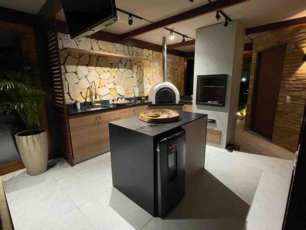 Køkken eller tekøkken på Cond Pé na Areia Victory Lucena