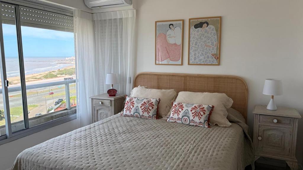 Ένα ή περισσότερα κρεβάτια σε δωμάτιο στο Apto Punta del Este stop 4 playa brava