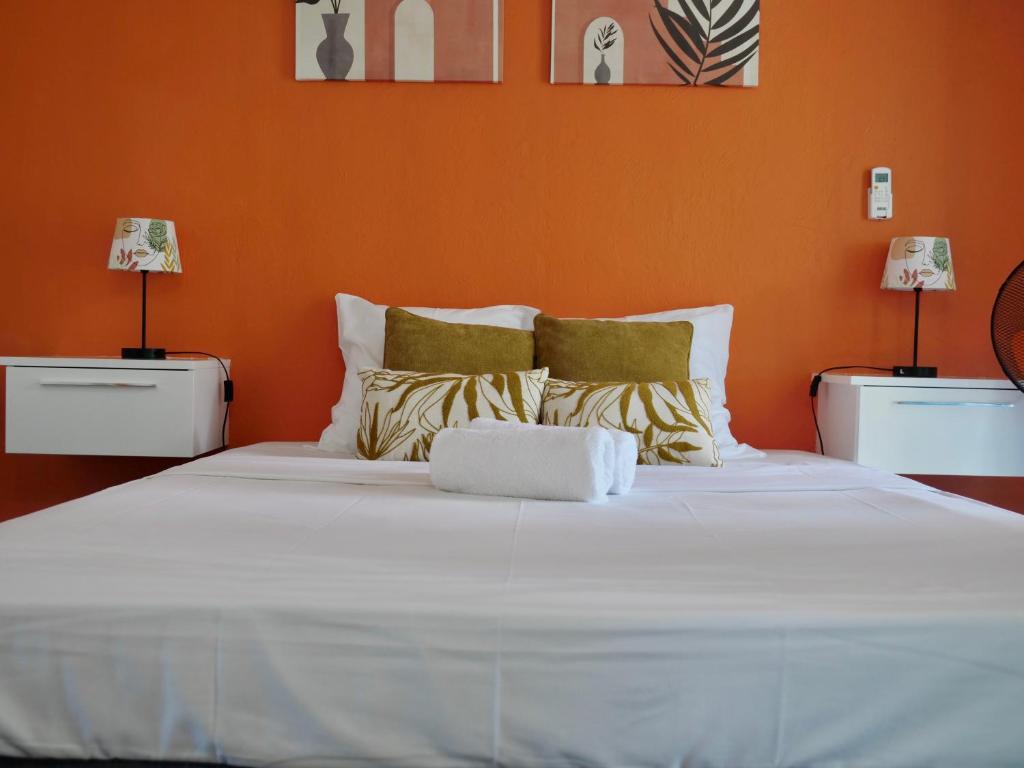 Ένα ή περισσότερα κρεβάτια σε δωμάτιο στο Le 116, studio chaleureux proche plage privée