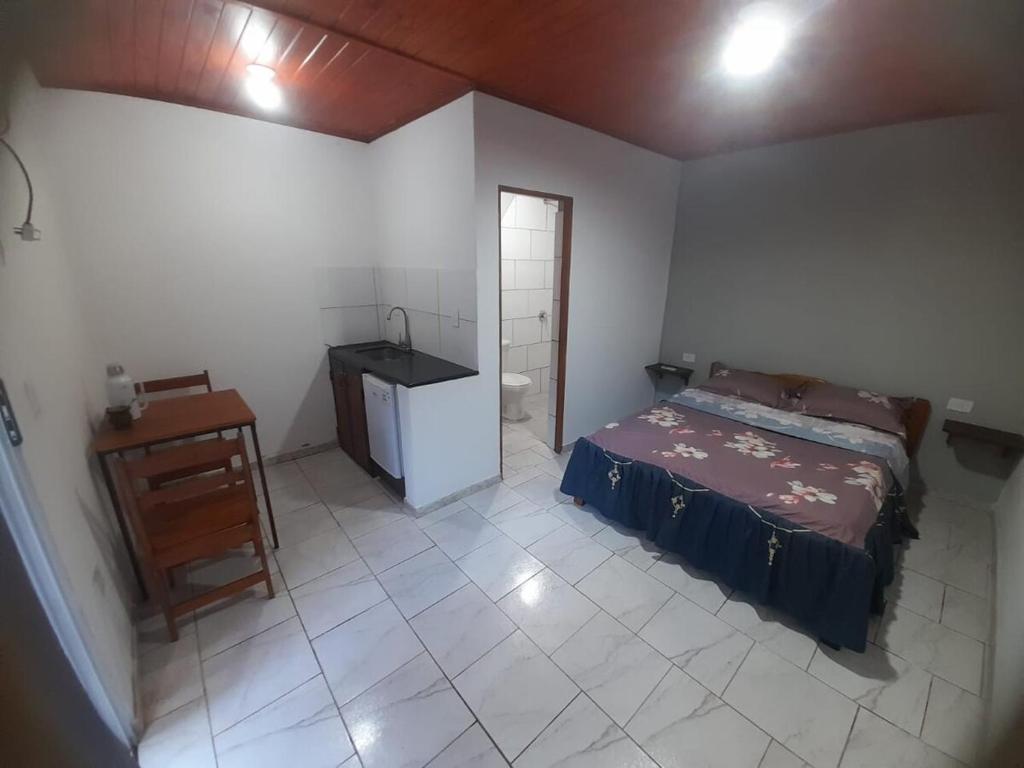 En eller flere senge i et værelse på Monoambiente céntrico