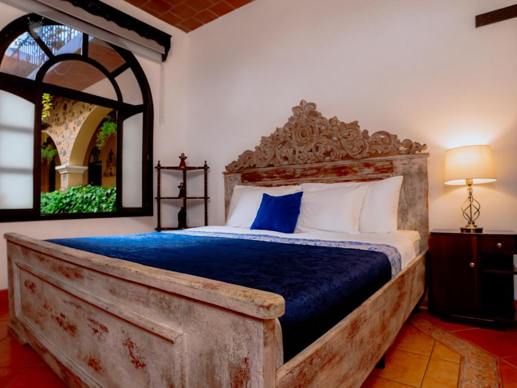 Postel nebo postele na pokoji v ubytování La Capitanía de San Pedro