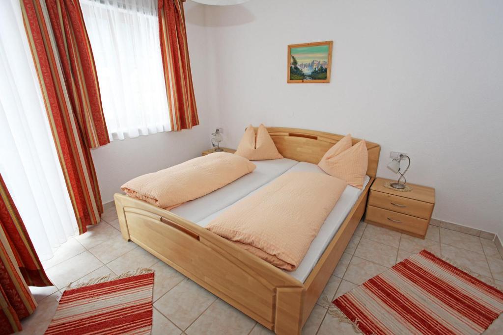 A bed or beds in a room at Appartementhaus Sabine