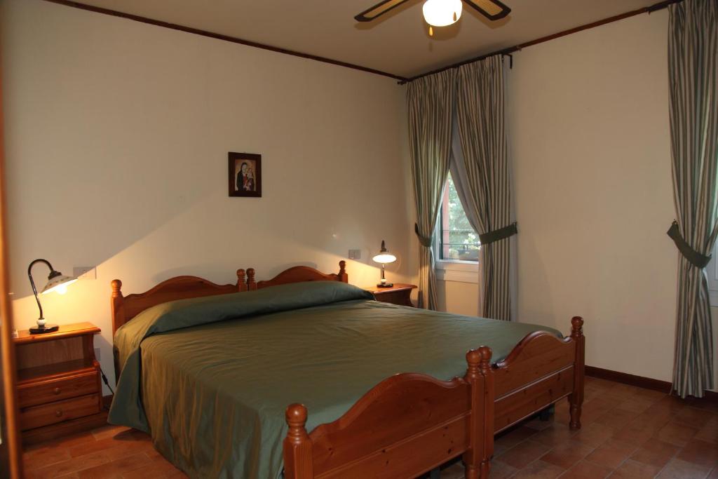 Posteľ alebo postele v izbe v ubytovaní Agriturismo Isola Augusta
