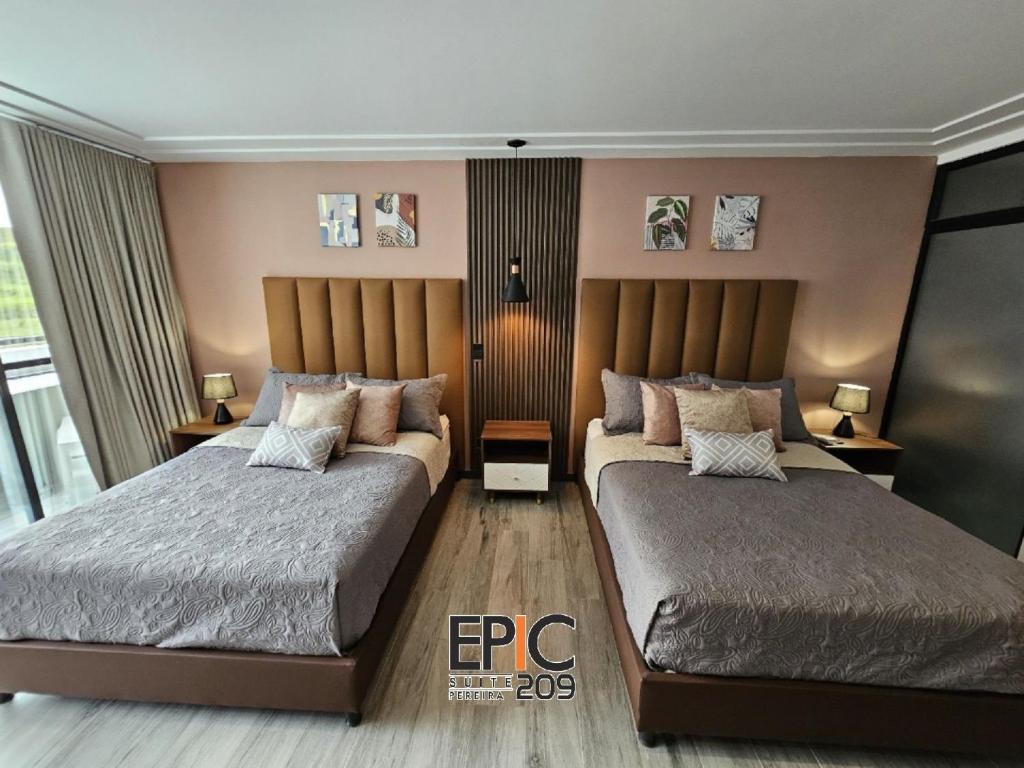 a bedroom with two beds and two lamps and a window at Epic Suite 209 Deluxe Aeropuerto in Cuba