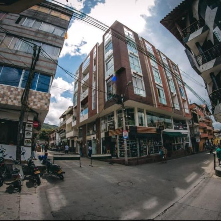 a building on a city street with motorcycles parked in front at The Best Corner in San Rafael