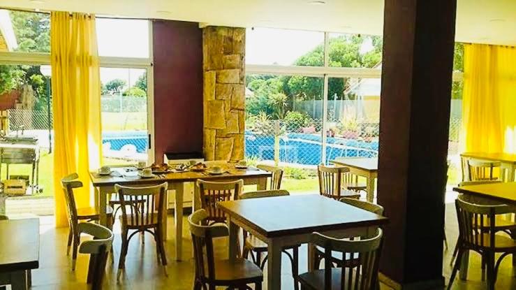 Бассейн в Hotel Los Acantilados или поблизости