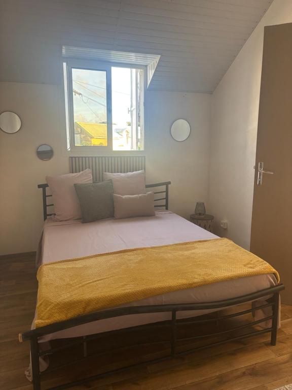 Ένα ή περισσότερα κρεβάτια σε δωμάτιο στο Kaz a maman