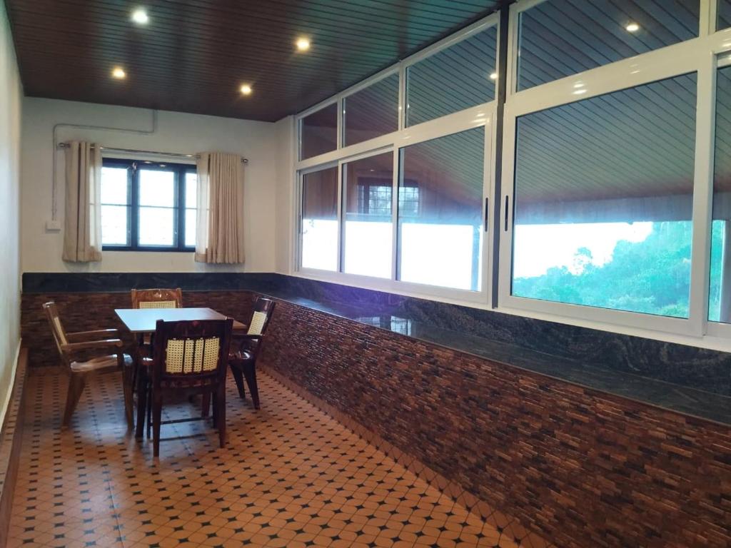 Φωτογραφία από το άλμπουμ του Bell Farms, Vagamon σε Kudayattūr