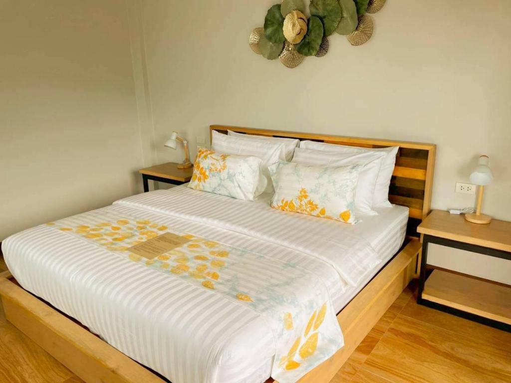 Ένα ή περισσότερα κρεβάτια σε δωμάτιο στο Secrest Boutique Kohtao Thailand