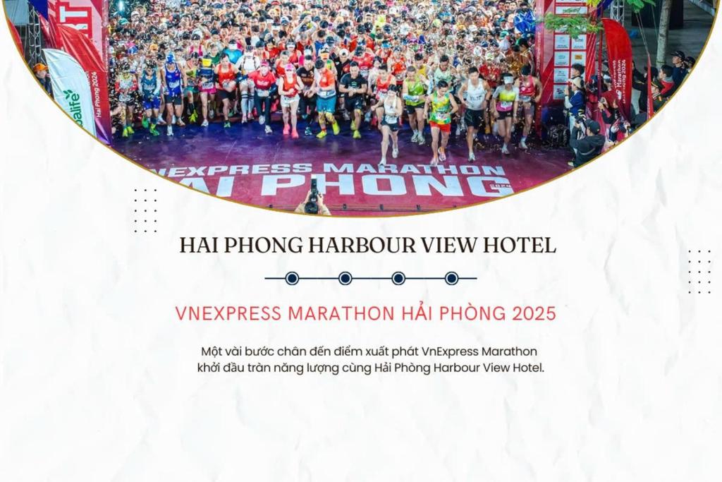 a poster for the marathon marathon in hanoi with a large group of people at Hai Phong Harbour View Hotel in Hai Phong