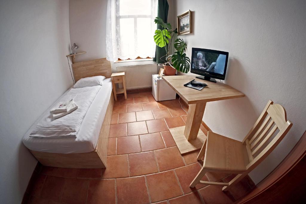 TV a/nebo společenská místnost v ubytování Hotel Kreta