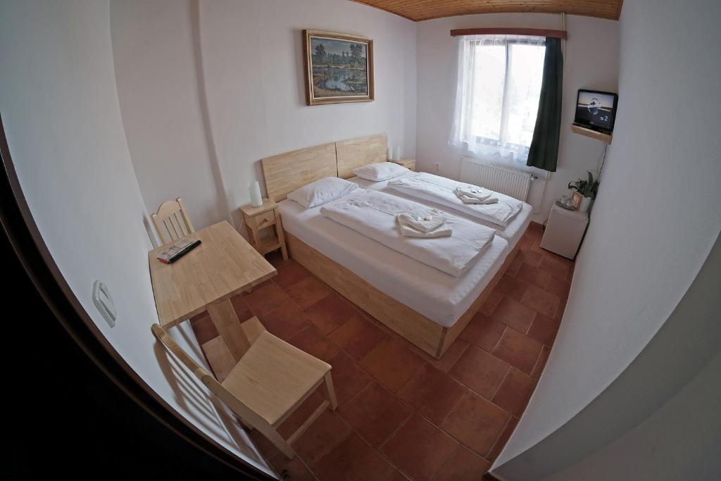 Postel nebo postele na pokoji v ubytování Hotel Kreta