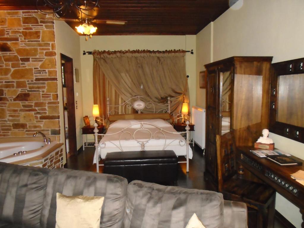 Łóżko lub łóżka w pokoju w obiekcie Luxury Guesthouse Pantheon
