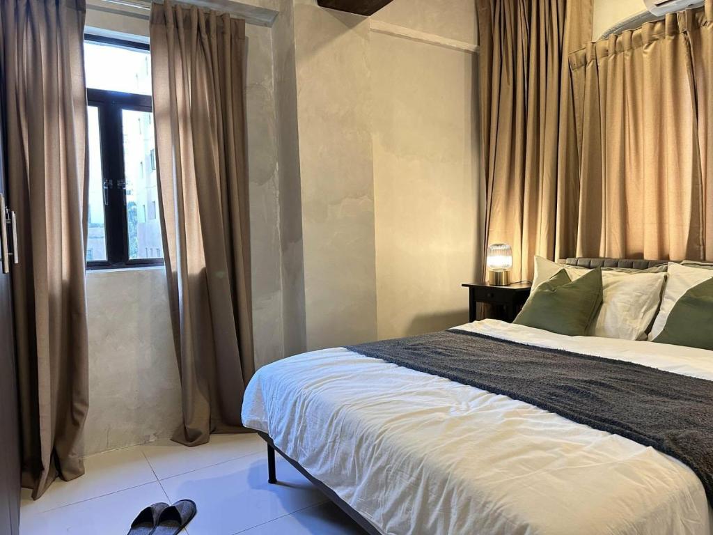 Ένα ή περισσότερα κρεβάτια σε δωμάτιο στο Near NAIA Newport Sarasota 1 BR Airport