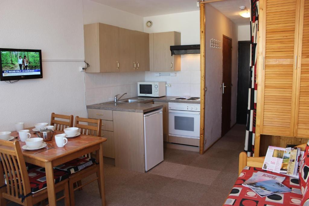 Kuchyň nebo kuchyňský kout v ubytování Dôme de Polset Appartements VTI