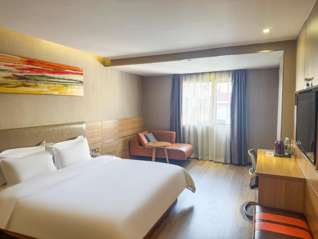 Μια τηλεόραση ή/και κέντρο ψυχαγωγίας στο 7天优品深圳龙岗大运中心爱联地铁站店