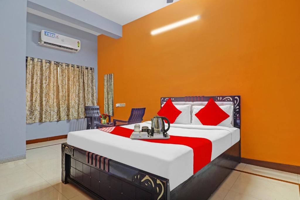 Ένα ή περισσότερα κρεβάτια σε δωμάτιο στο Hotel O FOURTEEN