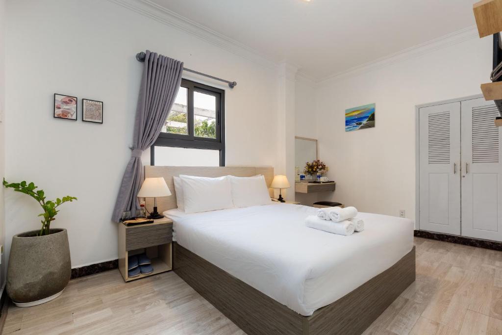 Ліжко або ліжка в номері Kas Premium Hotel