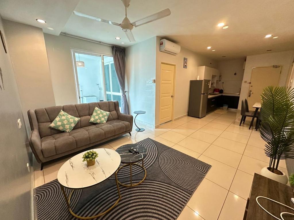 a living room with a couch and a table at High-Floor Seaview Modern Suite 2BR Condo Next to Gurney & Georgetown in George Town