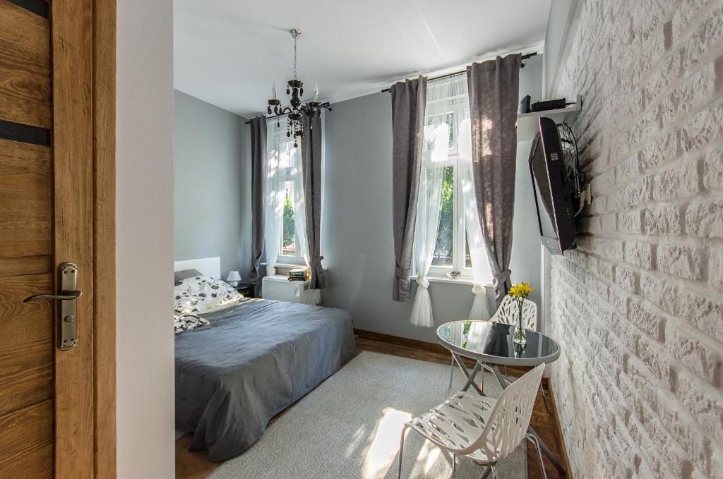 Posteľ alebo postele v izbe v ubytovaní Apartament Wierzbięcice