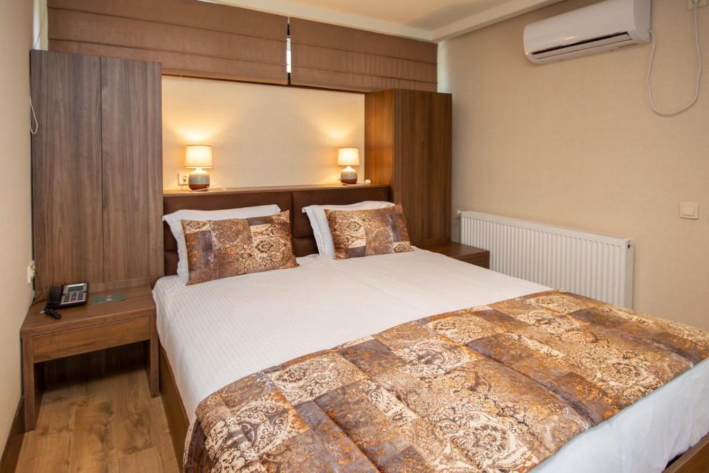 Ένα ή περισσότερα κρεβάτια σε δωμάτιο στο Seventeen Rooms