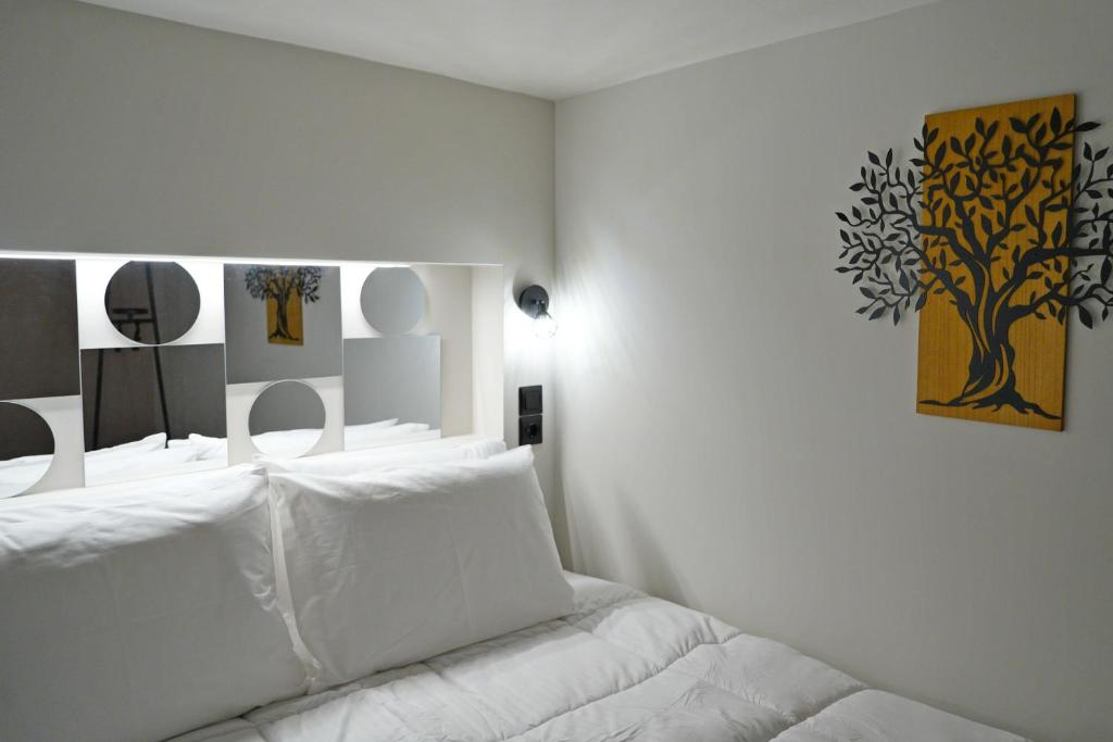 Ένα ή περισσότερα κρεβάτια σε δωμάτιο στο B & G's LOFT