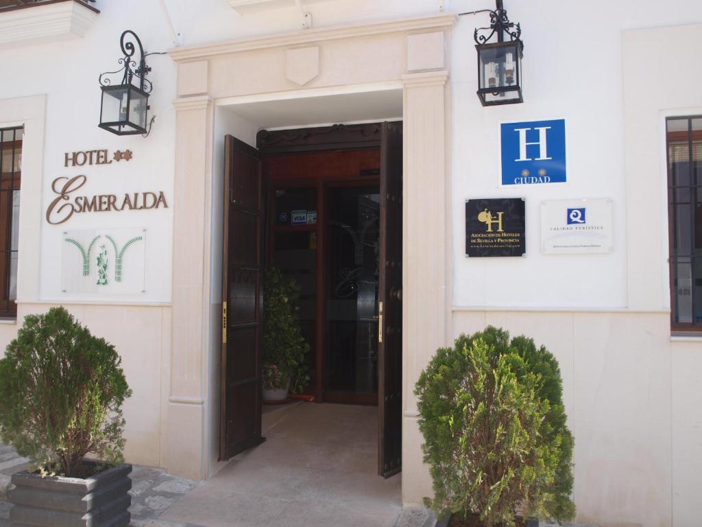 an entrance to a hotel with a door open at Hotel Esmeralda in Osuna