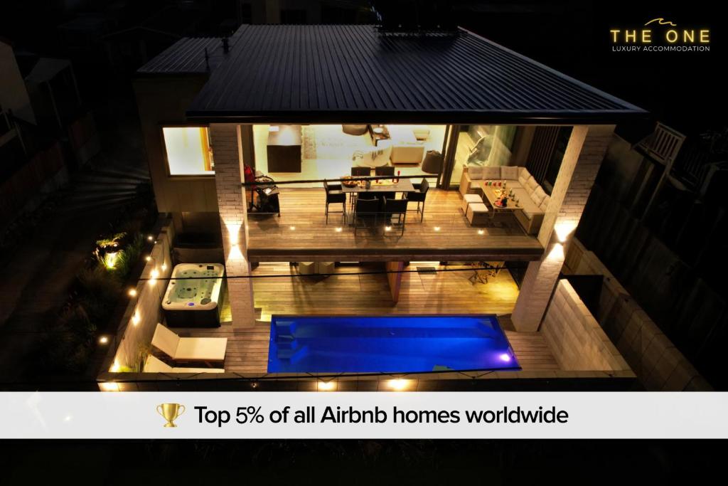 Φωτογραφία από το άλμπουμ του Luxury Papamoa Beach House with Pool and Spa Pet Friendly σε Papamoa