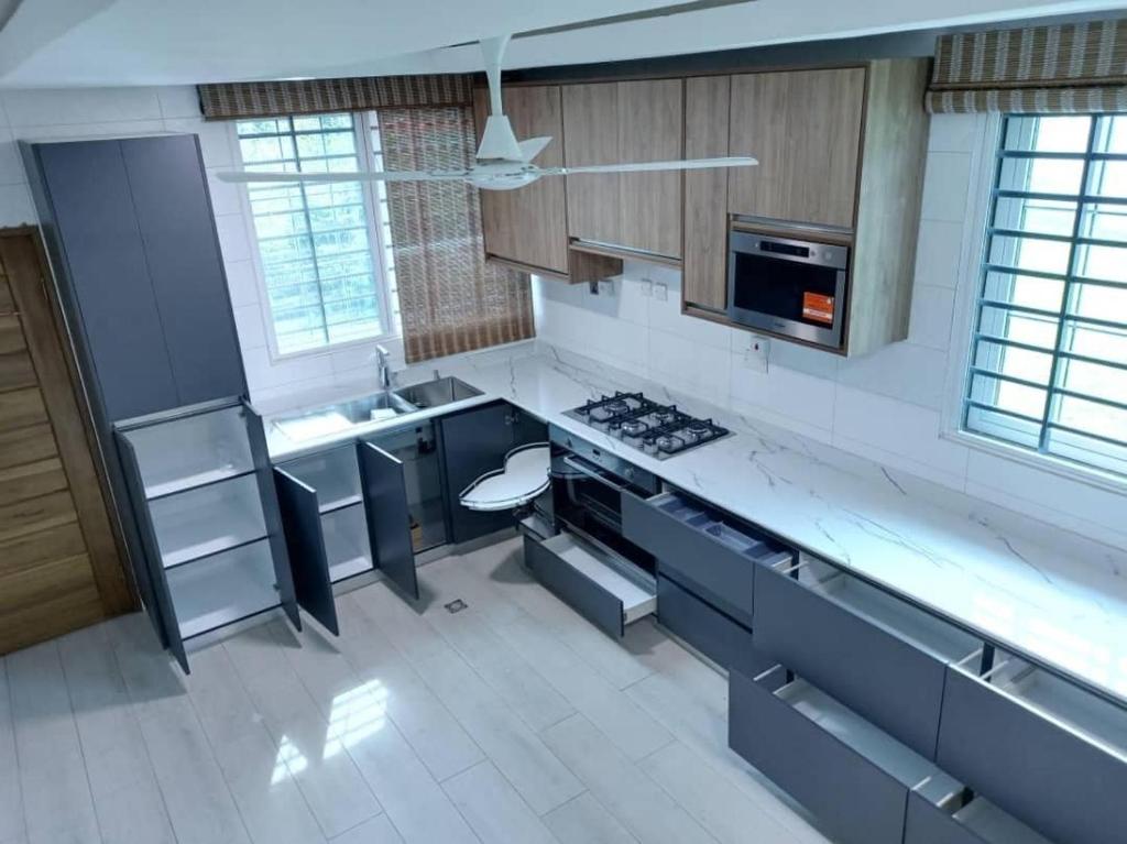 an overhead view of a kitchen with counters and cabinets at Ankyease Aclove in Kotrope