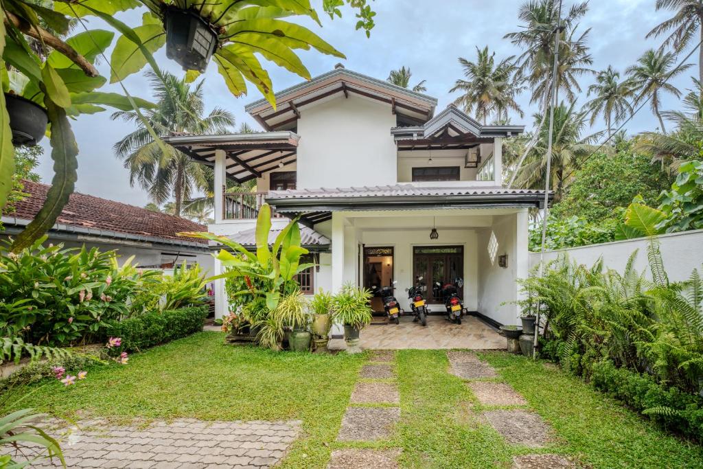 Un jardín fuera de Uyanawatta villa talpe