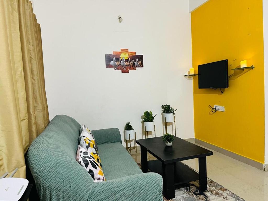 Μια τηλεόραση ή/και κέντρο ψυχαγωγίας στο DivBnB homes Whitefield - 1 BHK & 2BHK Near ITPL & Manipal,Vydehi