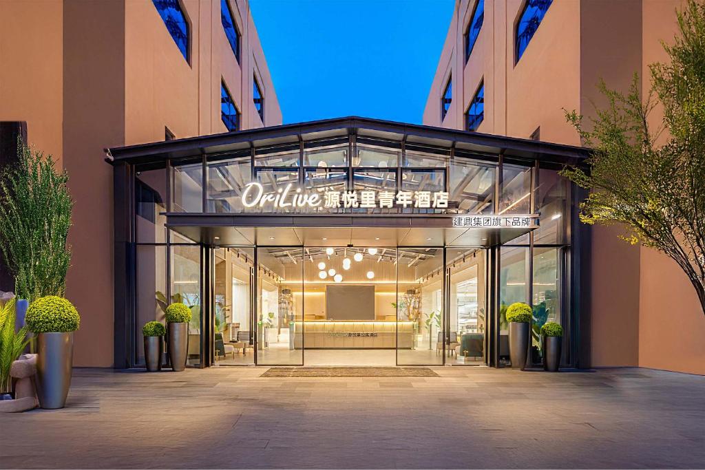 Η πρόσοψη ή η είσοδος του OriLive Youth Hotel Dongguan Guomao