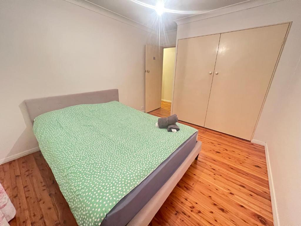 Ένα ή περισσότερα κρεβάτια σε δωμάτιο στο Room 84