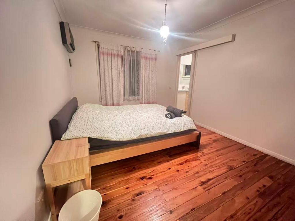 Ένα ή περισσότερα κρεβάτια σε δωμάτιο στο Room 85