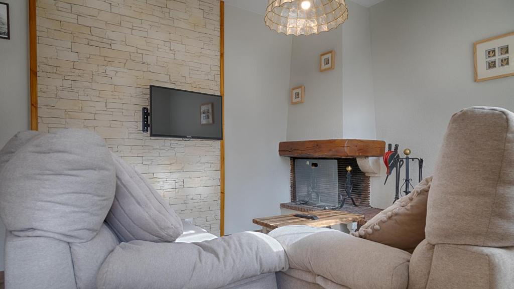 TV a/nebo společenská místnost v ubytování Saplan Real Estate SALARDÚ