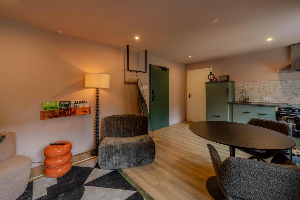 Kuchyň nebo kuchyňský kout v ubytování Petit Riche Apartments