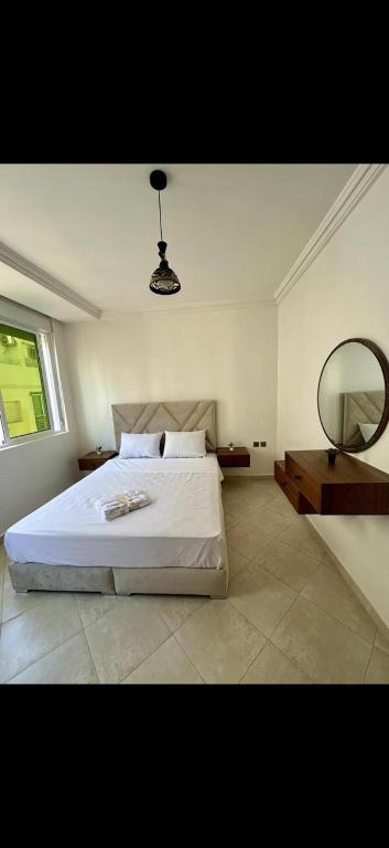 Postel nebo postele na pokoji v ubytování الشقة مجهزة للكراء اليومي