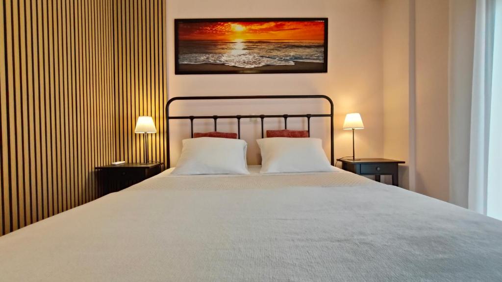 Ένα ή περισσότερα κρεβάτια σε δωμάτιο στο SiviriLovelyApartment