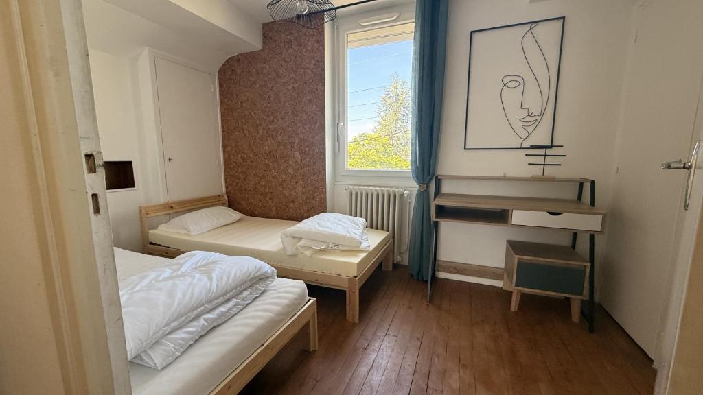 Postel nebo postele na pokoji v ubytování La Villa Montalat - Jolie et Calme