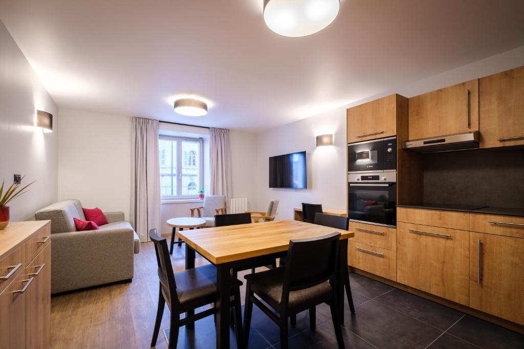 Kuchyň nebo kuchyňský kout v ubytování Résidence le 16 - Centre Ville