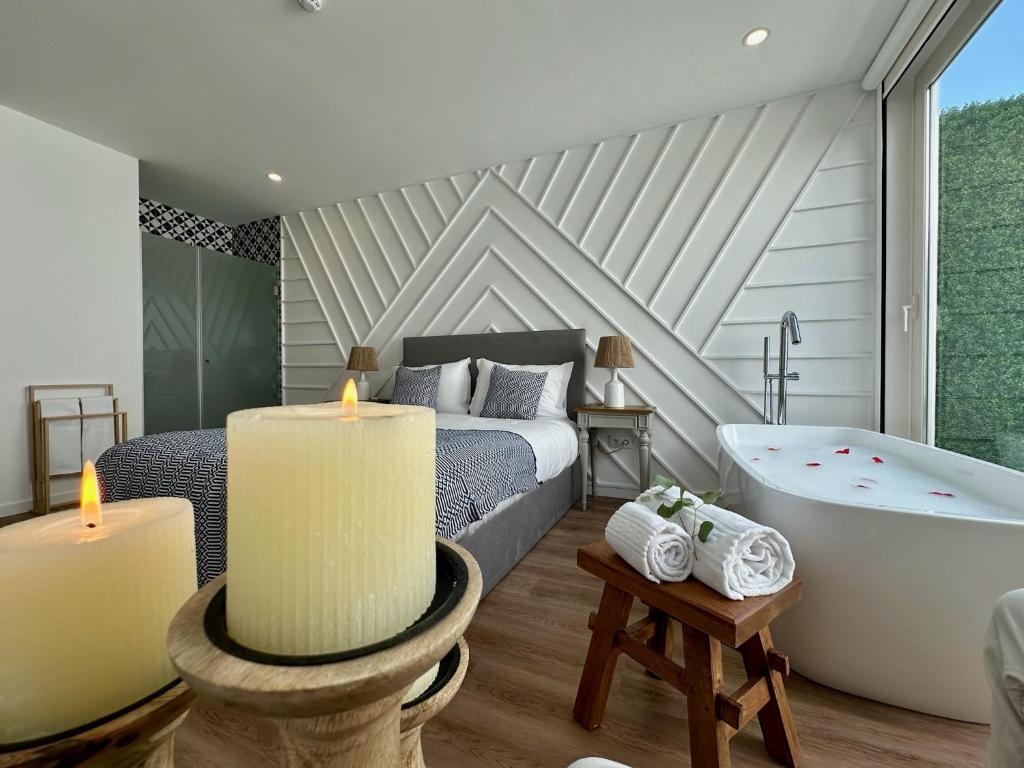 En eller flere senge i et værelse på Alentejo Charm House