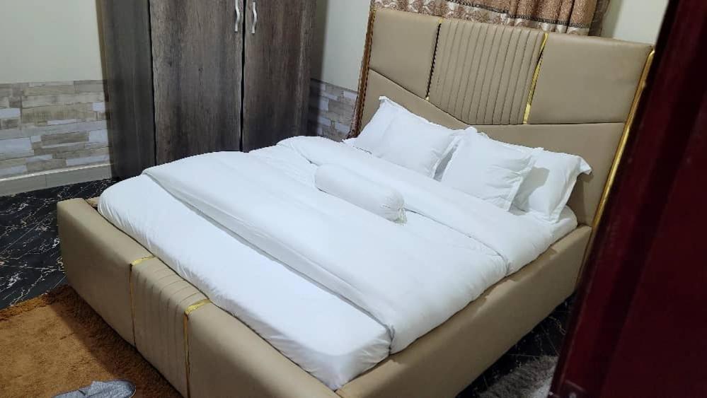 Postel nebo postele na pokoji v ubytování The cozy apartments