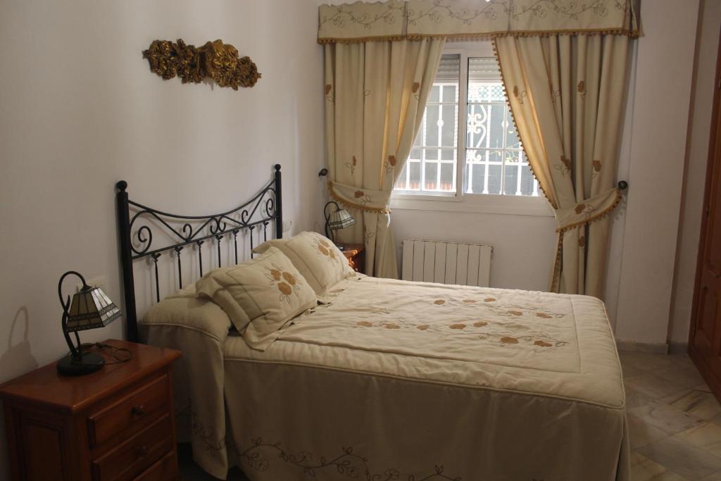 Ένα ή περισσότερα κρεβάτια σε δωμάτιο στο VillaFilomena