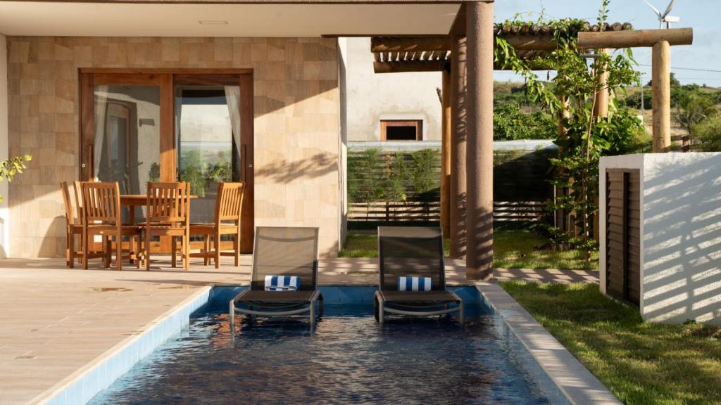 Πισίνα στο ή κοντά στο Casa de Praia The Coral Beach Resort