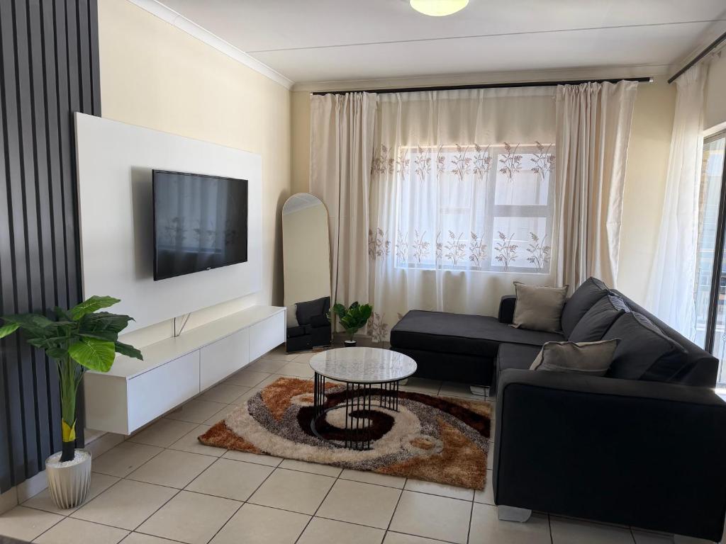 Et tv og/eller underholdning på Your easy stay OR Tambo