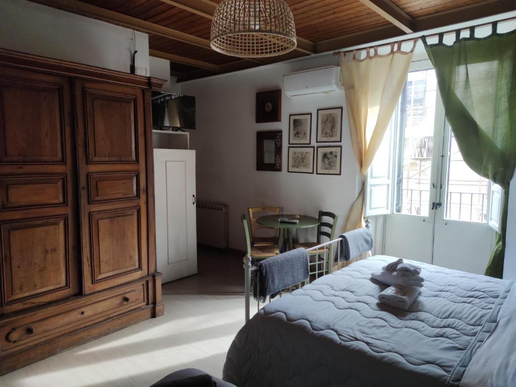 Ένα ή περισσότερα κρεβάτια σε δωμάτιο στο I Vespri